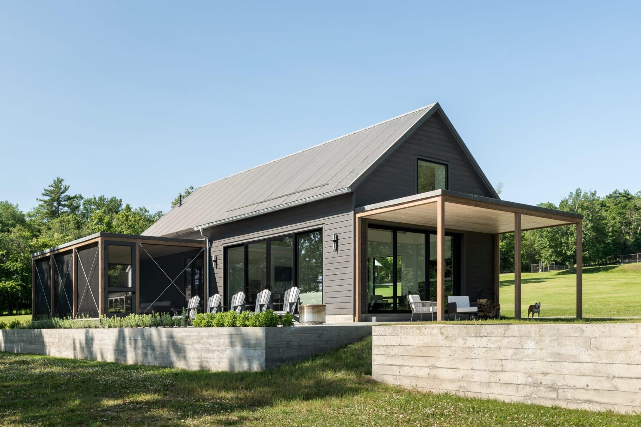 JoanHeatonArchitects_Lakeside-Pavilion_Exterior-Patio-Board-Form-Wall