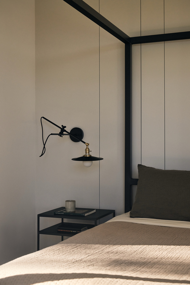 JoanHeatonArchitects_Weybridge-Renovation-Addition_Primary-Bedroom-Sconce-Headboard-Wall